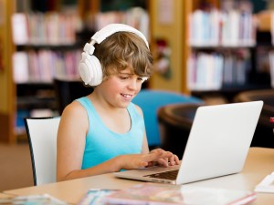 Boy spending time with notebook